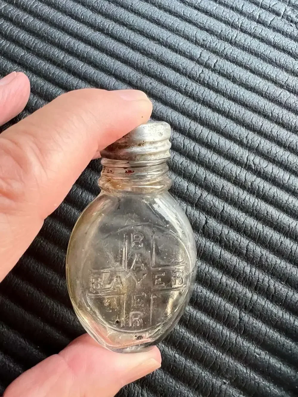 Vintage Bayer Aspirin Glass Bottle with Embossed Cross Design and Metal Cap